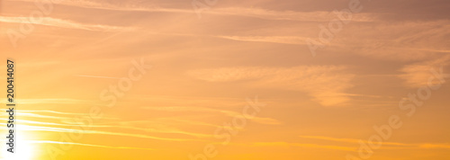 Orange sunset in the sky as a background