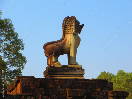 Proud lion statue atop Terrace of the Elephants in Angkor Thom, Cambodia