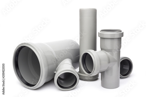 Grey plastic pipe on white background