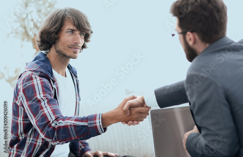 Fototapeta Naklejka Na Ścianę i Meble -  manager shakes hands with his client