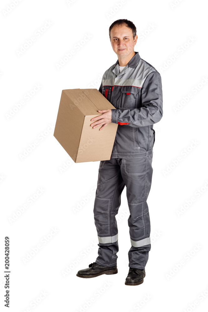 Male builder in a helmet with box and looking at camera over white wall background. repair, construction, building, people and maintenance concept. Male builder in a helmet with box and looking at camera over white wall background. repair, construction, building, people and maintenance concept.