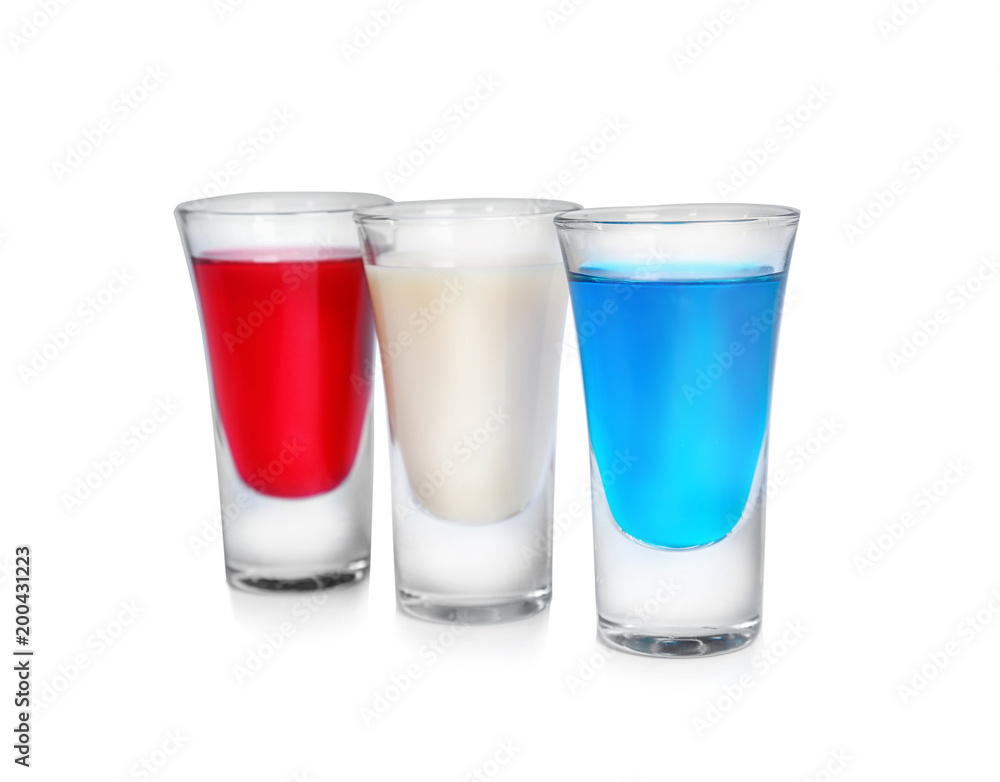 Cocktails in colors of American flag on white background