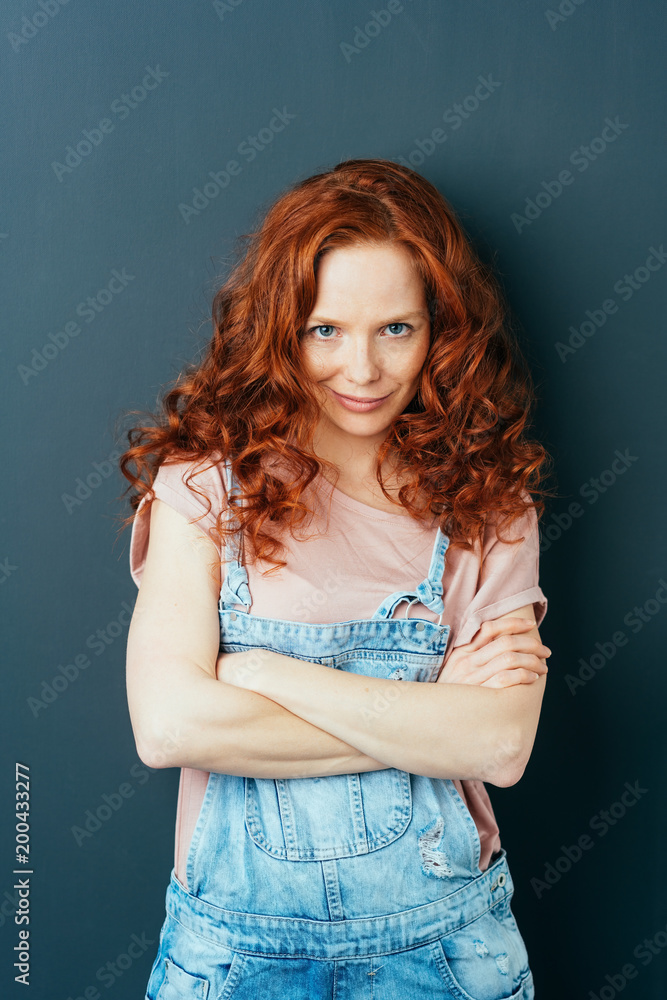 Speculative young woman staring intently at camera Speculative young woman staring intently at camera