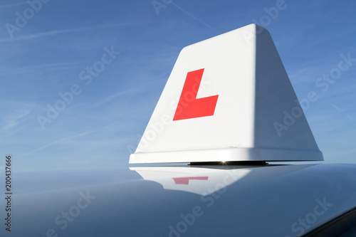 British driving school car roof sign