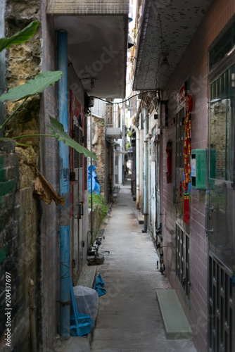 Tiny narrow streets of the walled village of Kat Hing Wai near Hong Kong in the morning - 3