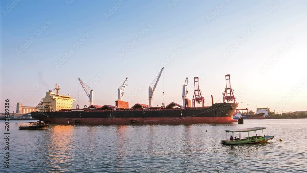 time lapse,Cargo ships carrying cargo at evening. time lapse,Cargo ships carrying cargo at evening.