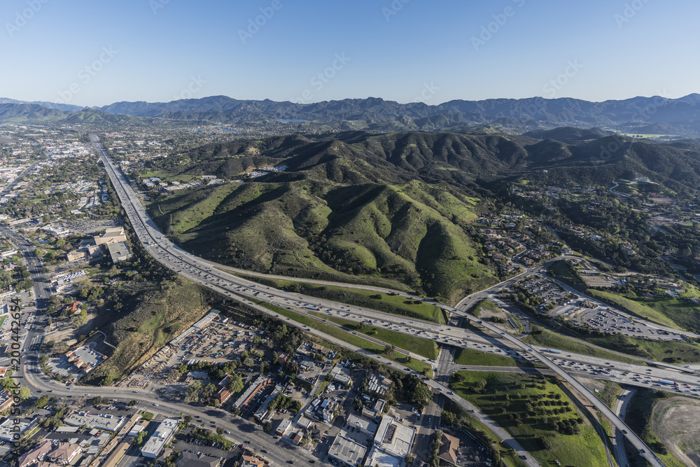 Aerial view of Ventura 101 Freeway and suburban Thousand Oaks near Los Angeles in scenic Southern California.