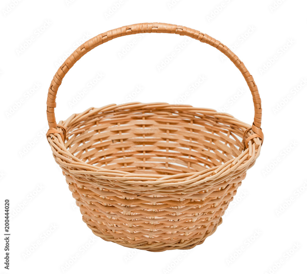 Wicker basket made of straw isolated on white background Wicker basket made of straw isolated on white background