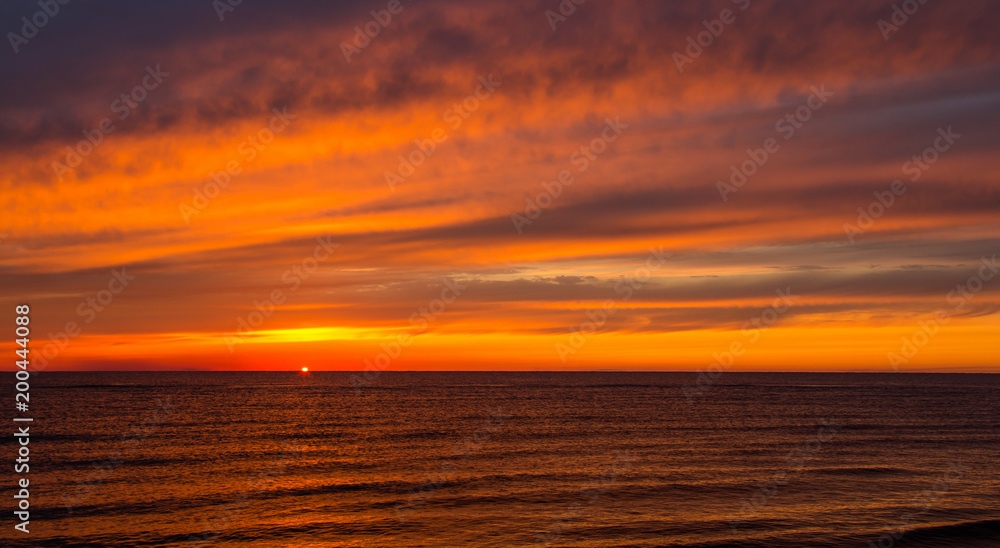 Golden sunset / dawn at sea