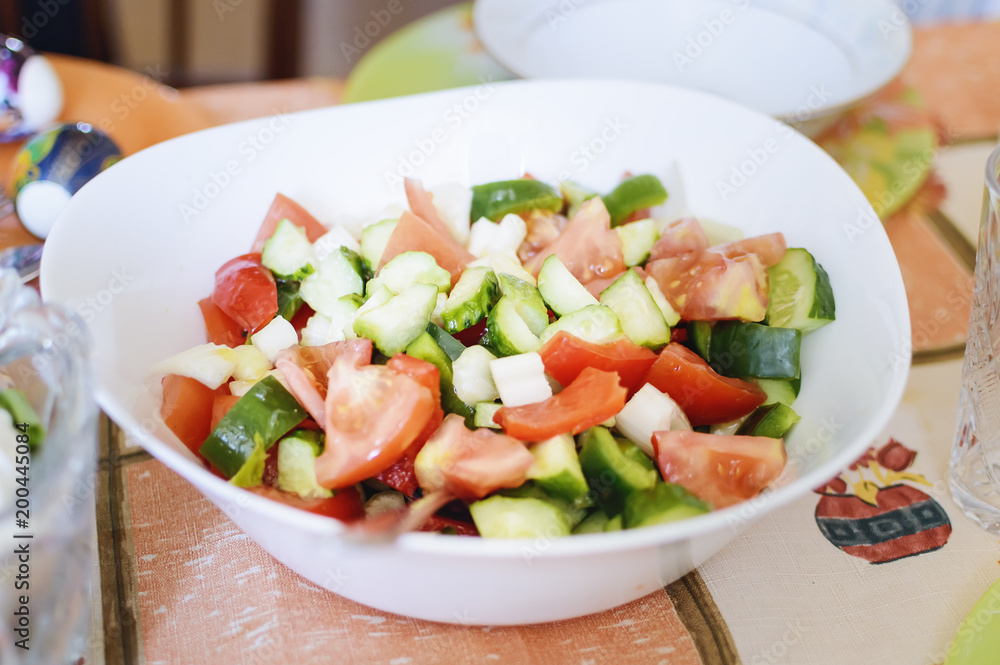 Salad of fresh tomatoes and cucumbers. Homemade natural food.