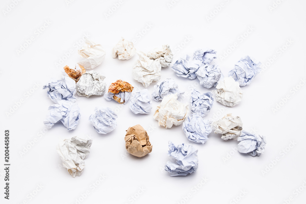 Naklejka premium Crumpled papers on white background