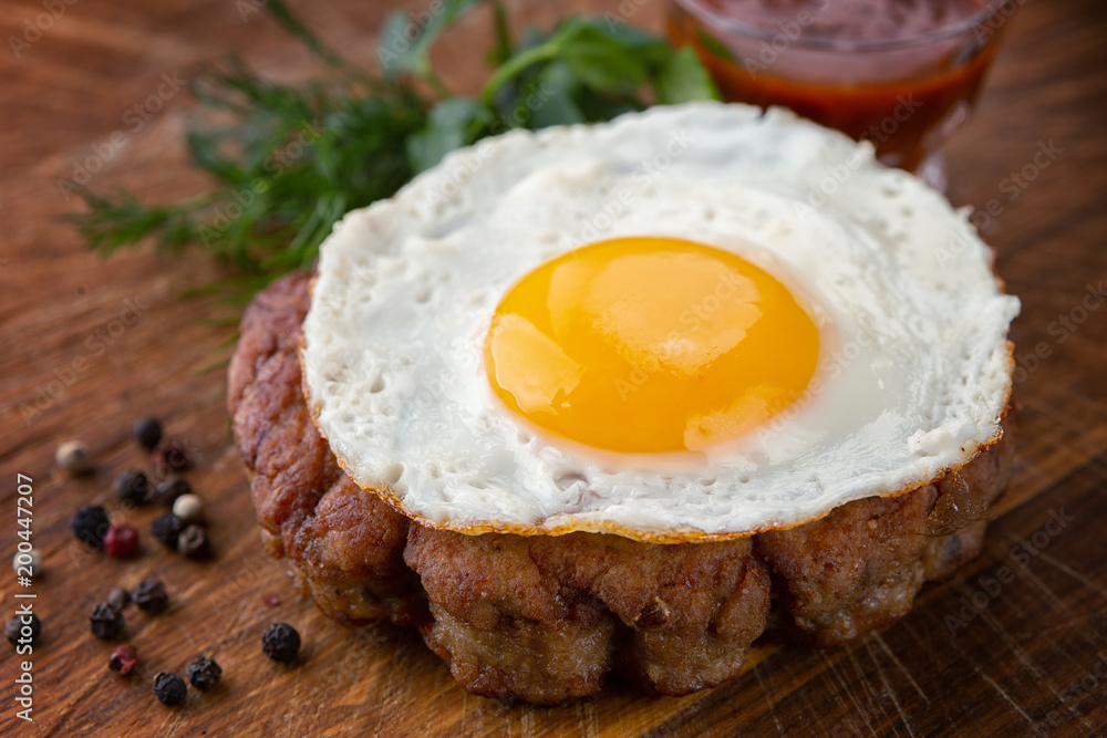 Fried beefsteak with egg Fried beefsteak with egg
