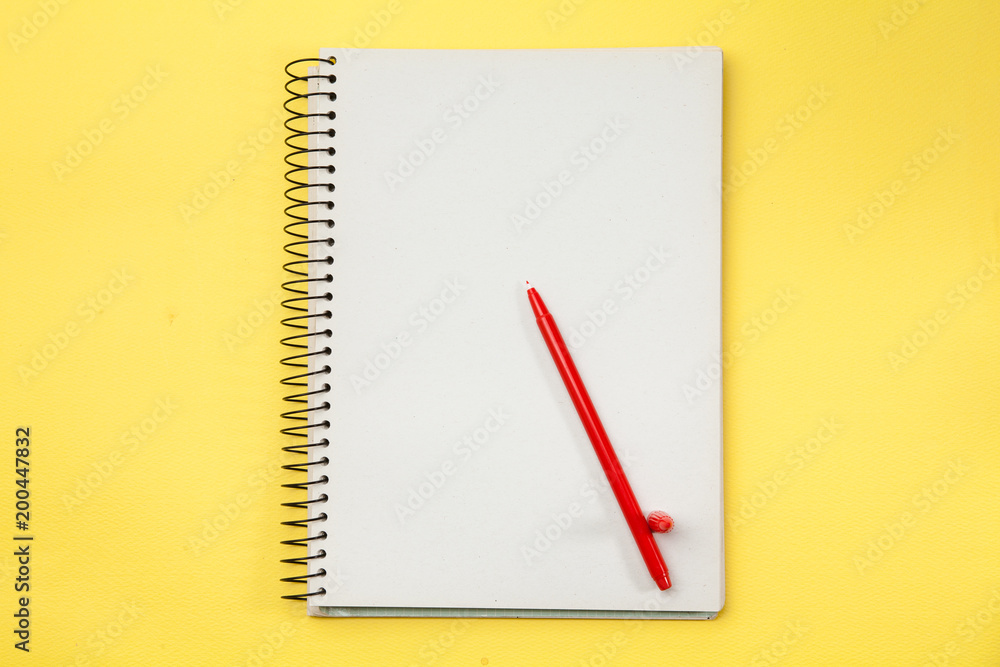 Study note book with red pen Study note book with red pen