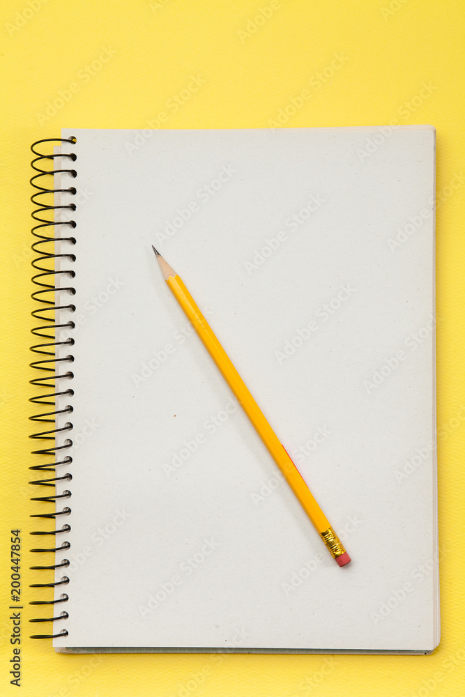 Study note book with yellow pencil Study note book with yellow pencil