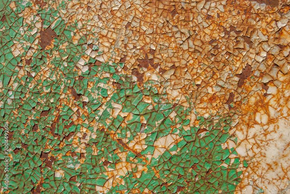 painted iron surface with a large rusty and metal corrosion, chipped paint, old background with peeling and cracking paint, green texture painted iron surface with a large rusty and metal corrosion, chipped paint, old background with peeling and cracking paint, green texture