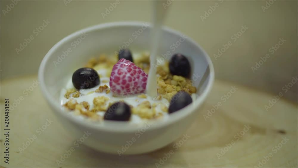 Berries, flakes, pour milk. Raspberry with milk. Raspberry in milk. Berries and flakes are filled with milk. Berries, flakes, pour milk. Raspberry with milk. Raspberry in milk. Berries and flakes are filled with milk.