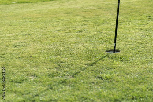 putting green on a sunny day