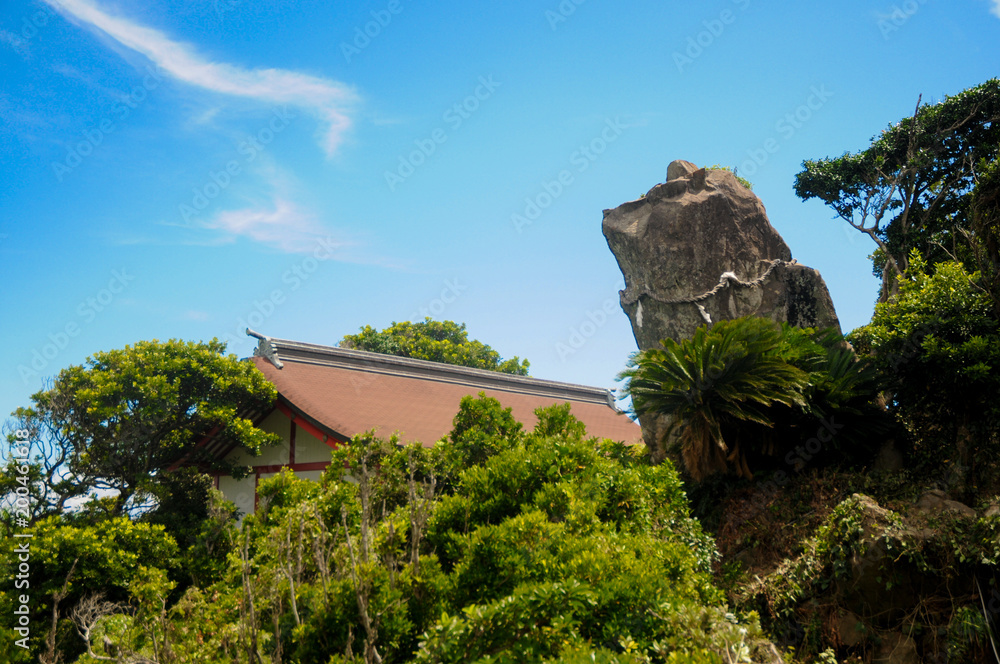 Dog Rock at the Udo Jingu - Shinto Shrine located in Miyazaki, Japan. This rock looks like a dog watching and protecting the shrine. This place is popular about love and romance.