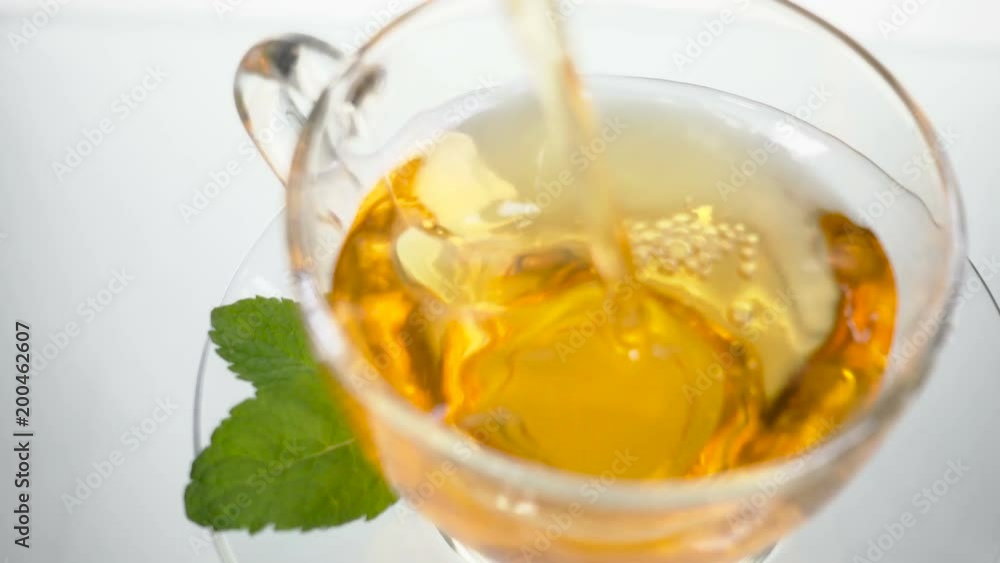 Glass cups of tea with mint on isolated on white background. top view Glass cups of tea with mint on isolated on white background. top view