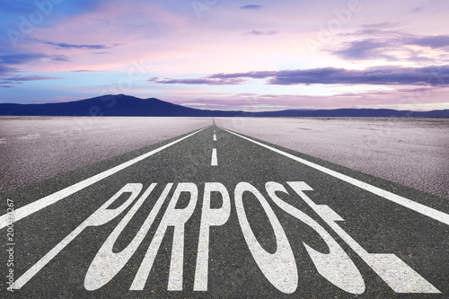 purpose text on highway and sunset