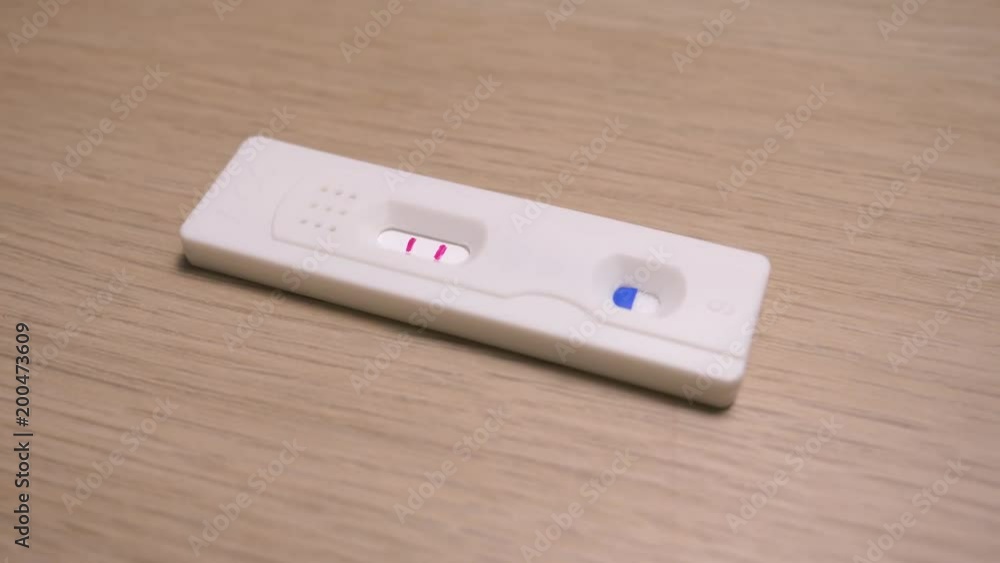 A pregnancy test showing a positive result A pregnancy test showing a positive result