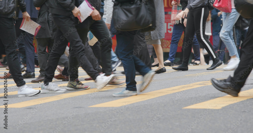 People walking in the street in city at Hong Kong People walking in the street in city at Hong Kong