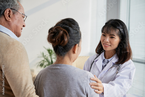 Doctor talking to patients