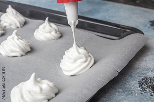 Fotografie Whipped cream on baking paper