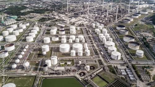 Aerial view white fuel storage tank in oil refinery plant, Top view white Industrial tanks for petrol and oil.