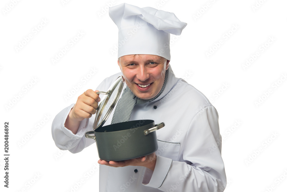 cook, on white background, holds a pan in his hands and smiles cook, on white background, holds a pan in his hands and smiles