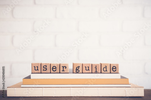 The word User guide and copy space background.