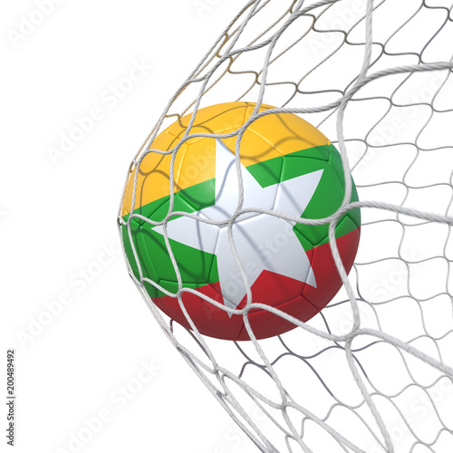 Myanmar flag soccer ball inside the net, in a net. © vahekatrjyan