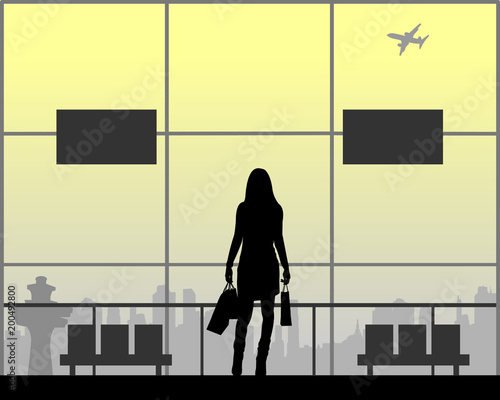 The girl is returning from shopping at the airport, one in the series of similar images silhouette