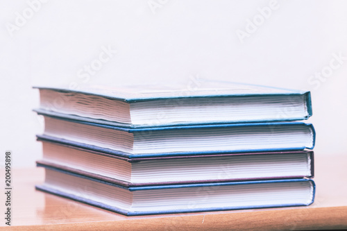 Pile of books on a light background