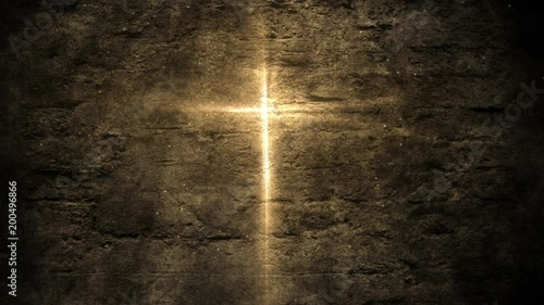 Glowing christian holy cross on cement wall background