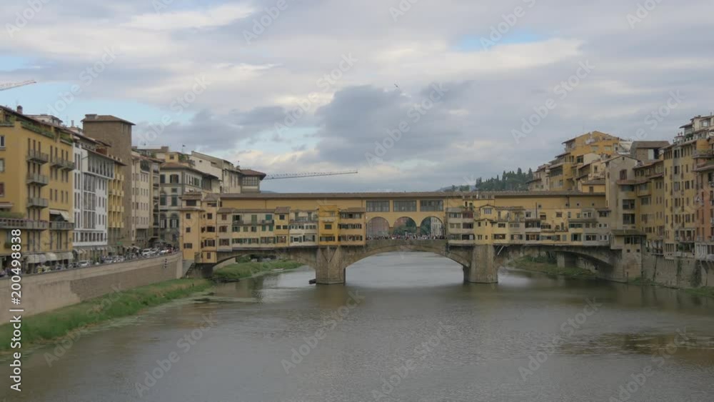 A bridge with buildings on a cloudy day A bridge with buildings on a cloudy day