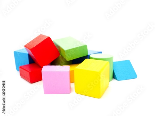 Colorful wooden shape block on isolated white background © korawig