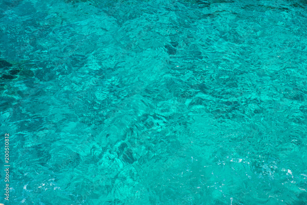 Natural background of emerald, turquoise sea water