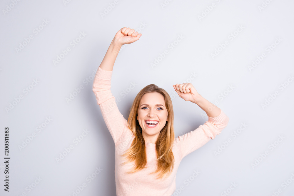 Education casual sweater shout luck omg people emotion expressing person concept. Close up portrait of cheerful excited joyful rejoicing delightful girl raising fists up isolated on gray background Education casual sweater shout luck omg people emotion expressing person concept. Close up portrait of cheerful excited joyful rejoicing delightful girl raising fists up isolated on gray background
