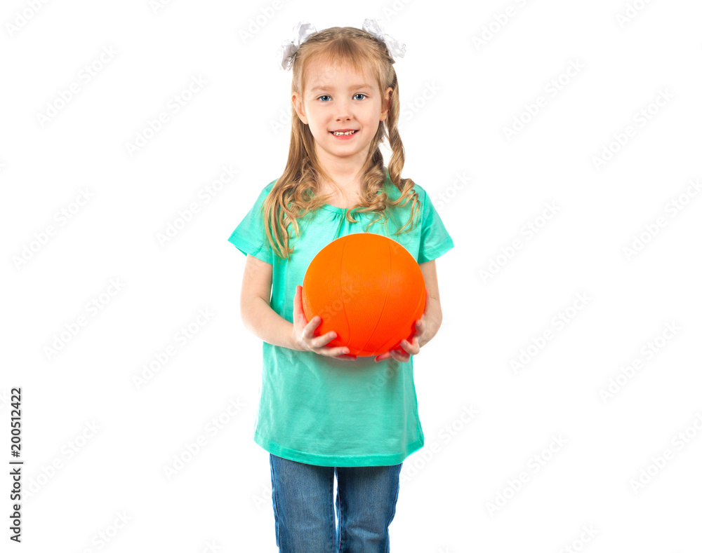 Cute little girl with a ball looking into the camera and smiling Cute little girl with a ball looking into the camera and smiling
