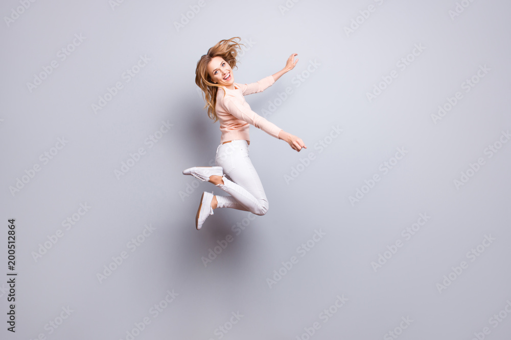 Fototapeta premium Trousers sneakers pants white pose rejoice exams pass people person concept. Full-size portrait of charming excited crazy mad manager jumping up isolated on gray background copy-space