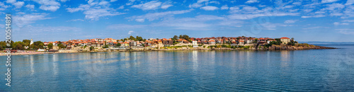Seaside landscape, panorama, banner - view of the embankment with fortress wall and beach in the city of Sozopol on the Black Sea coast in Bulgaria