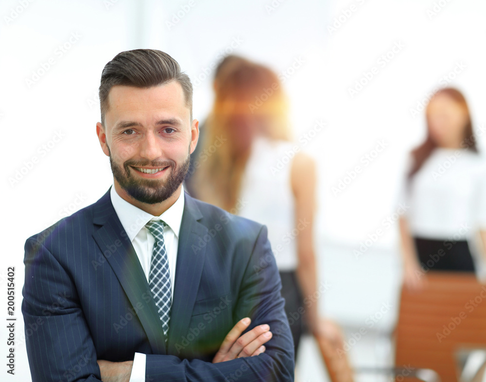 businessman on background of office. businessman on background of office.