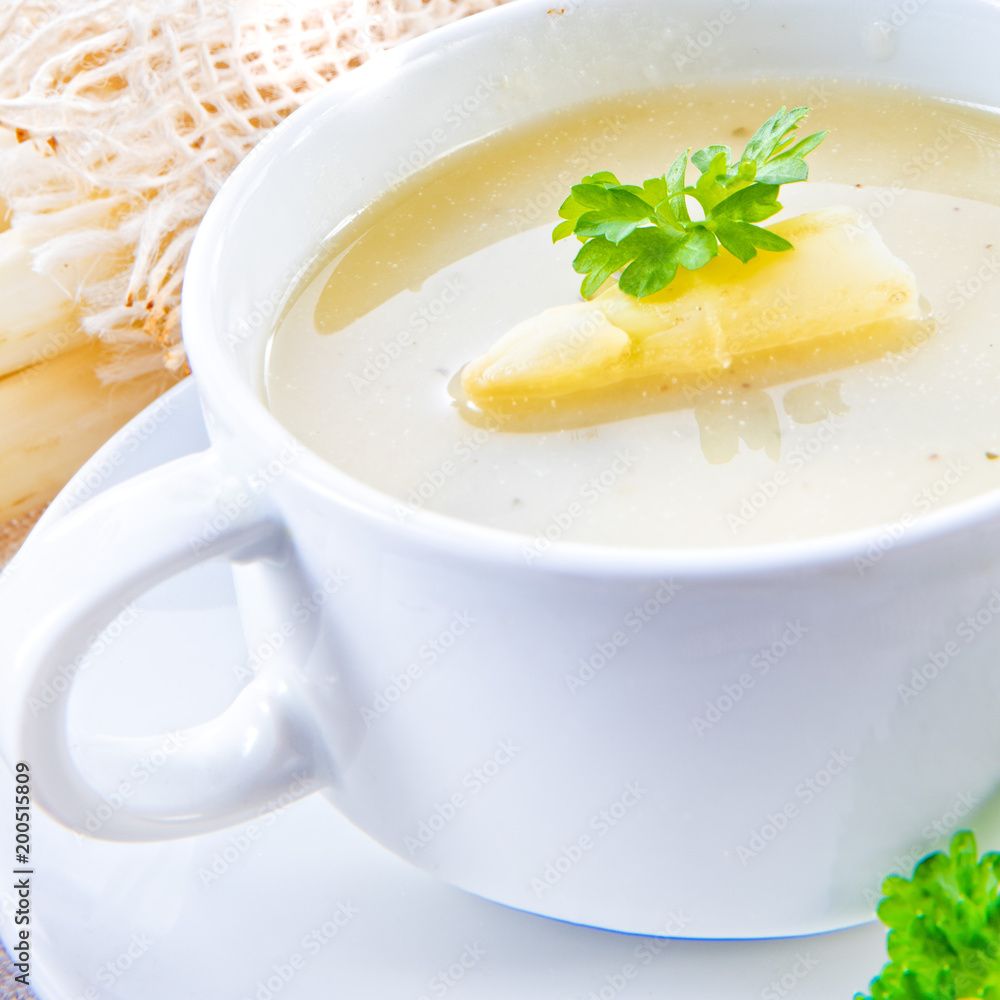 asparagus cream soup with capers and fresh baguette asparagus cream soup with capers and fresh baguette