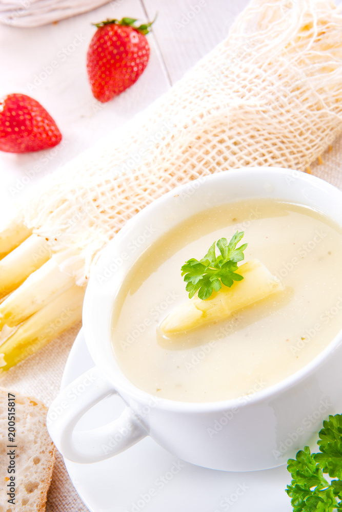 asparagus cream soup with capers and fresh baguette asparagus cream soup with capers and fresh baguette