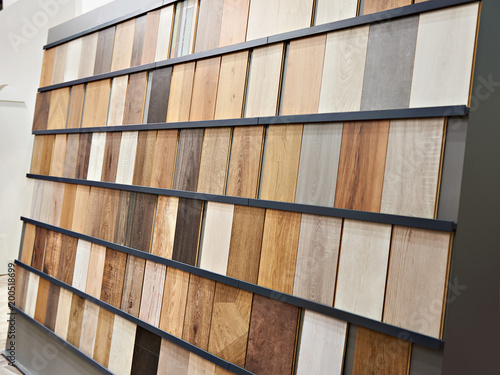 Samples of wooden laminate panels in store