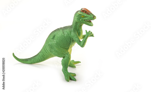 Dinosaur toy with open mouth on the white © OttoPles