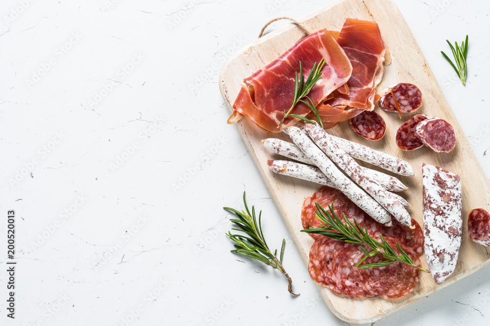 Wall Mural Traditional italian antipasto on white.