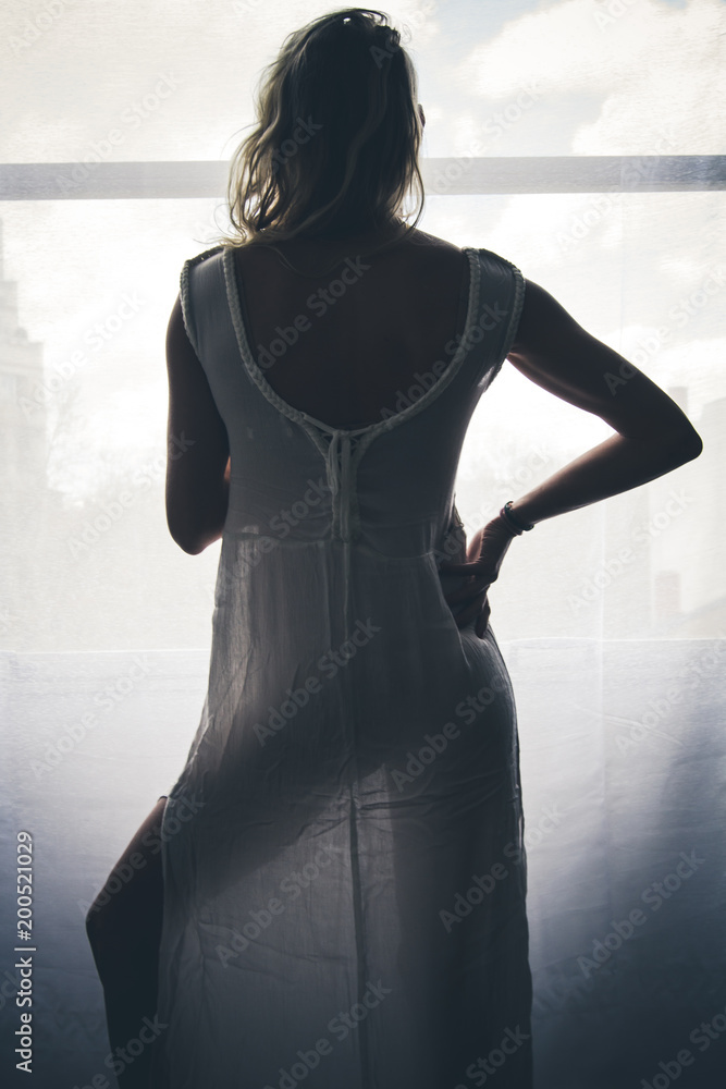 Jolie femme en robe transparente Photos | Adobe Stock