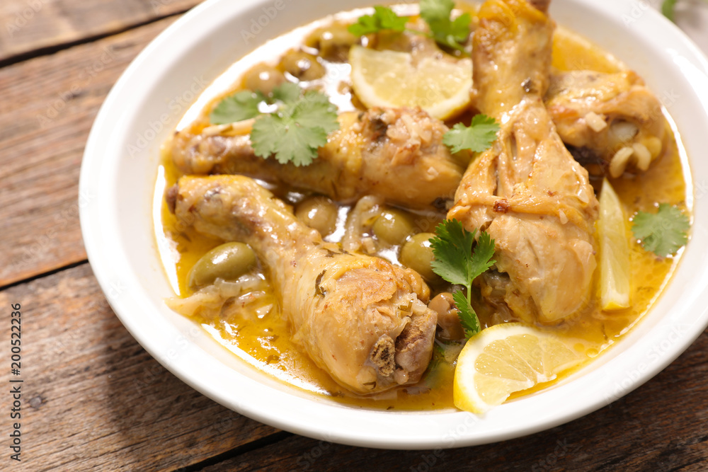 chicken leg cooked with olive, coriander and lemon chicken leg cooked with olive, coriander and lemon
